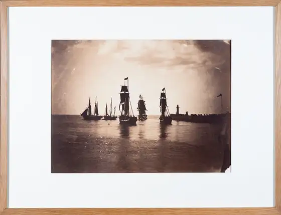 Gustave Le Gray, Bateaux quittant le port du Havre , albumen print, 1856–57. Sailing ships leaving Le Havre past the jetty and lighthouse. Context: not the…